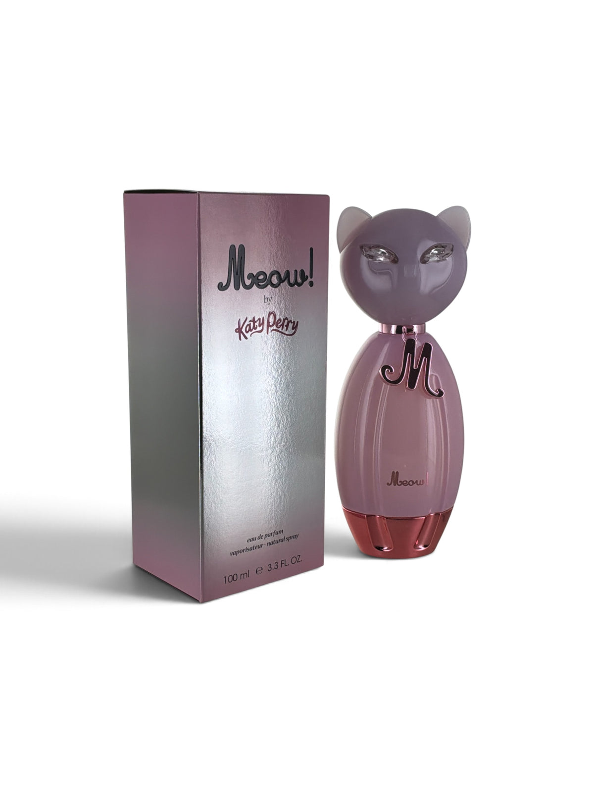 "Meow Katy Perry fruity vanilla-floral perfume for women, bottle next to its packaging"