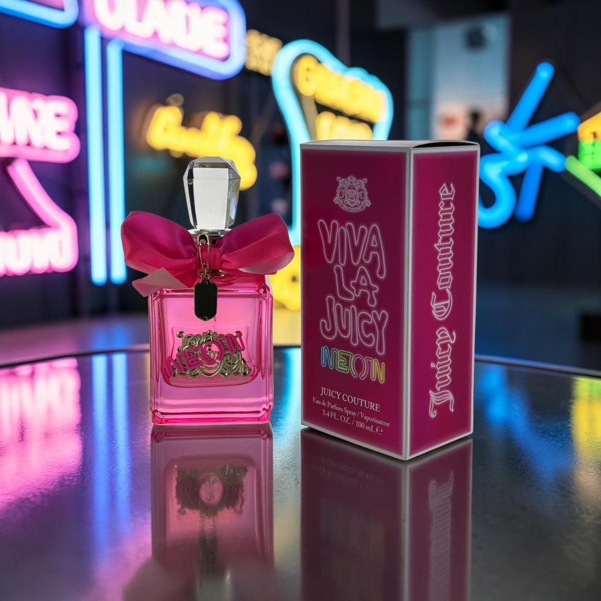"Juicy Couture Viva La Juicy Neon women's perfume box, vibrant pink packaging"