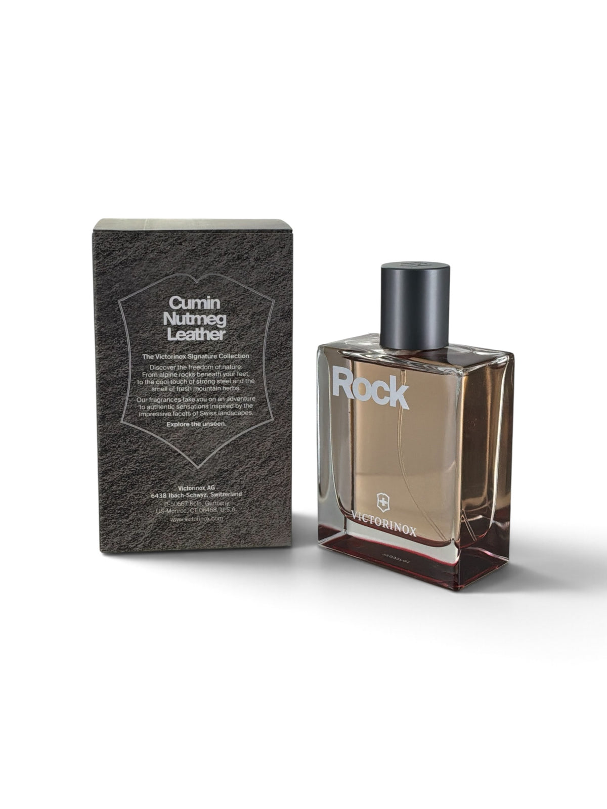 "Swiss Army Rock leathery spicy cologne for men, bottle next to its packaging"